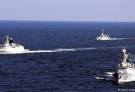 中国海军于南海仲裁前在西沙军演 外媒称“秀肌肉”